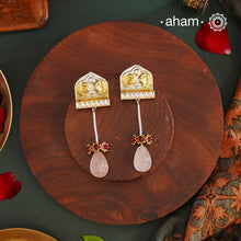 Noori two tone Earrings. The earrings are handcrafted in 92.5 sterling silver with gold highlights and a rose quartz drop. Style this up with your favourite ethnic or fusion outfits to complete the look.