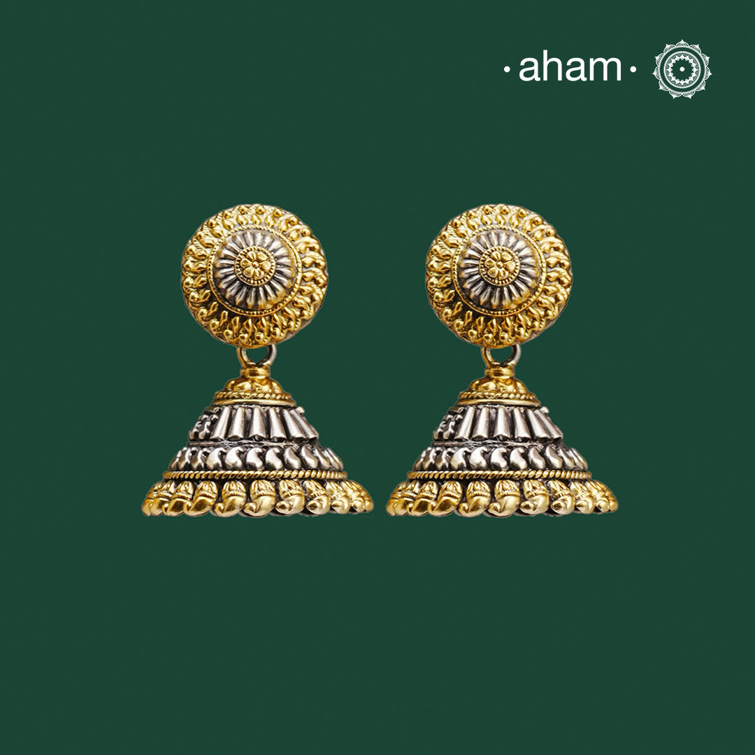 Noori two tone Earrings. The earrings are handcrafted in 92.5 sterling silver with gold highlights. Style this up with your favourite ethnic or fusion outfits to complete the look.