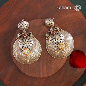 Noori two tone Earrings. The earrings are handcrafted in 92.5 sterling silver with gold highlights. Style this up with your favourite ethnic or fusion outfits to complete the look.