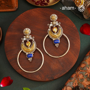 Noori two tone Earrings. The earrings are handcrafted in 92.5 sterling silver with gold highlights. Style this up with your favourite ethnic or fusion outfits to complete the look.