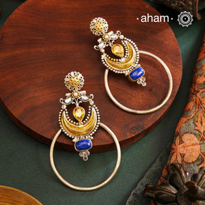 Noori two tone Earrings. The earrings are handcrafted in 92.5 sterling silver with gold highlights. Style this up with your favourite ethnic or fusion outfits to complete the look.