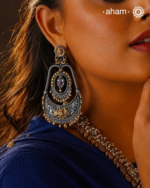 Noori two tone Earrings. The earrings are handcrafted in 92.5 sterling silver with gold highlights. Style this up with your favourite ethnic or fusion outfits to complete the look.