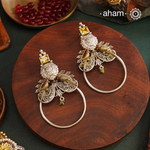 Noori two tone Earrings. The earrings are handcrafted in 92.5 sterling silver with gold highlights. Style this up with your favourite ethnic or fusion outfits to complete the look.