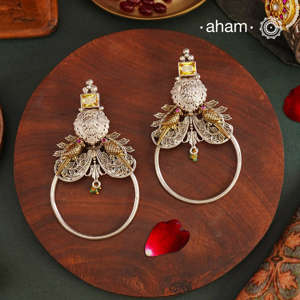 Noori two tone Earrings. The earrings are handcrafted in 92.5 sterling silver with gold highlights. Style this up with your favourite ethnic or fusion outfits to complete the look.