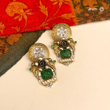 Noori two tone Earrings. The earrings are handcrafted in 92.5 sterling silver with gold highlights. Style this up with your favourite ethnic or fusion outfits to complete the look.