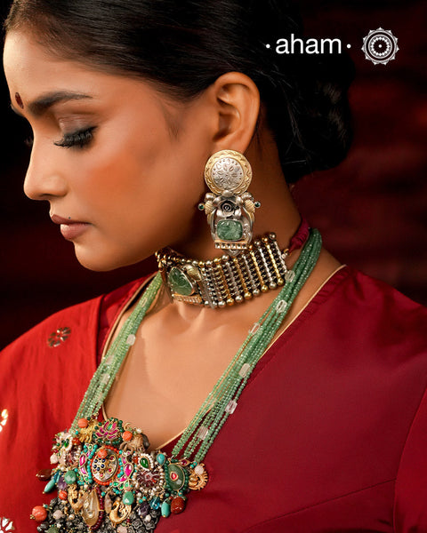 Noori two tone Earrings. The earrings are handcrafted in 92.5 sterling silver with gold highlights. Style this up with your favourite ethnic or fusion outfits to complete the look.