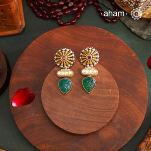 Noori two tone Earrings. The earrings are handcrafted in 92.5 sterling silver with gold highlights. Style this up with your favourite ethnic or fusion outfits to complete the look.