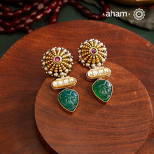 Noori two tone Earrings. The earrings are handcrafted in 92.5 sterling silver with gold highlights. Style this up with your favourite ethnic or fusion outfits to complete the look.