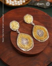 Light weight Noori two tone earrings handcrafted in 92.5 sterling silver with gold highlights. Style this up with your favourite ethnic or fusion outfits to complete the look.