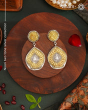 Light weight Noori two tone earrings handcrafted in 92.5 sterling silver with gold highlights. Style this up with your favourite ethnic or fusion outfits to complete the look.
