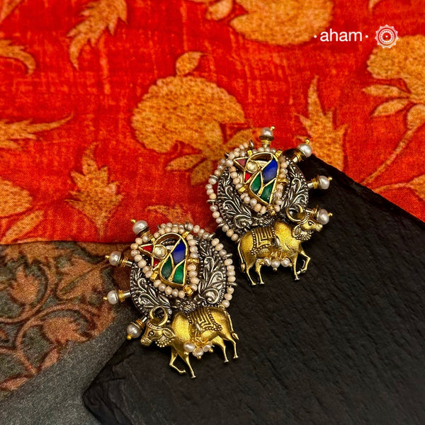 Noori two tone Earrings. The earrings are handcrafted in 92.5 sterling silver with gold highlights. Style this up with your favourite ethnic or fusion outfits to complete the look.