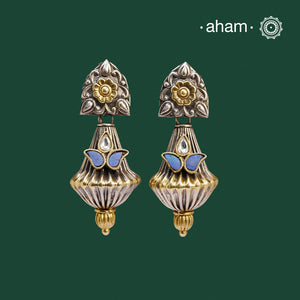 Noori two tone Earrings. The earrings are handcrafted in 92.5 sterling silver with gold and blue stone highlights. Style this up with your favourite ethnic or fusion outfits to complete the look.