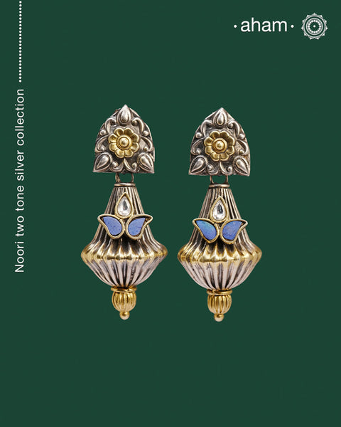 Noori two tone Earrings. The earrings are handcrafted in 92.5 sterling silver with gold and blue stone highlights. Style this up with your favourite ethnic or fusion outfits to complete the look.