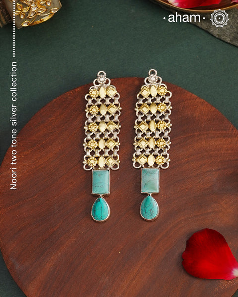 Noori two tone handcrafted in 92.5 sterling silver with gold highlights and turquoise drop. Style this up with your favourite ethnic or fusion outfits to complete the look.