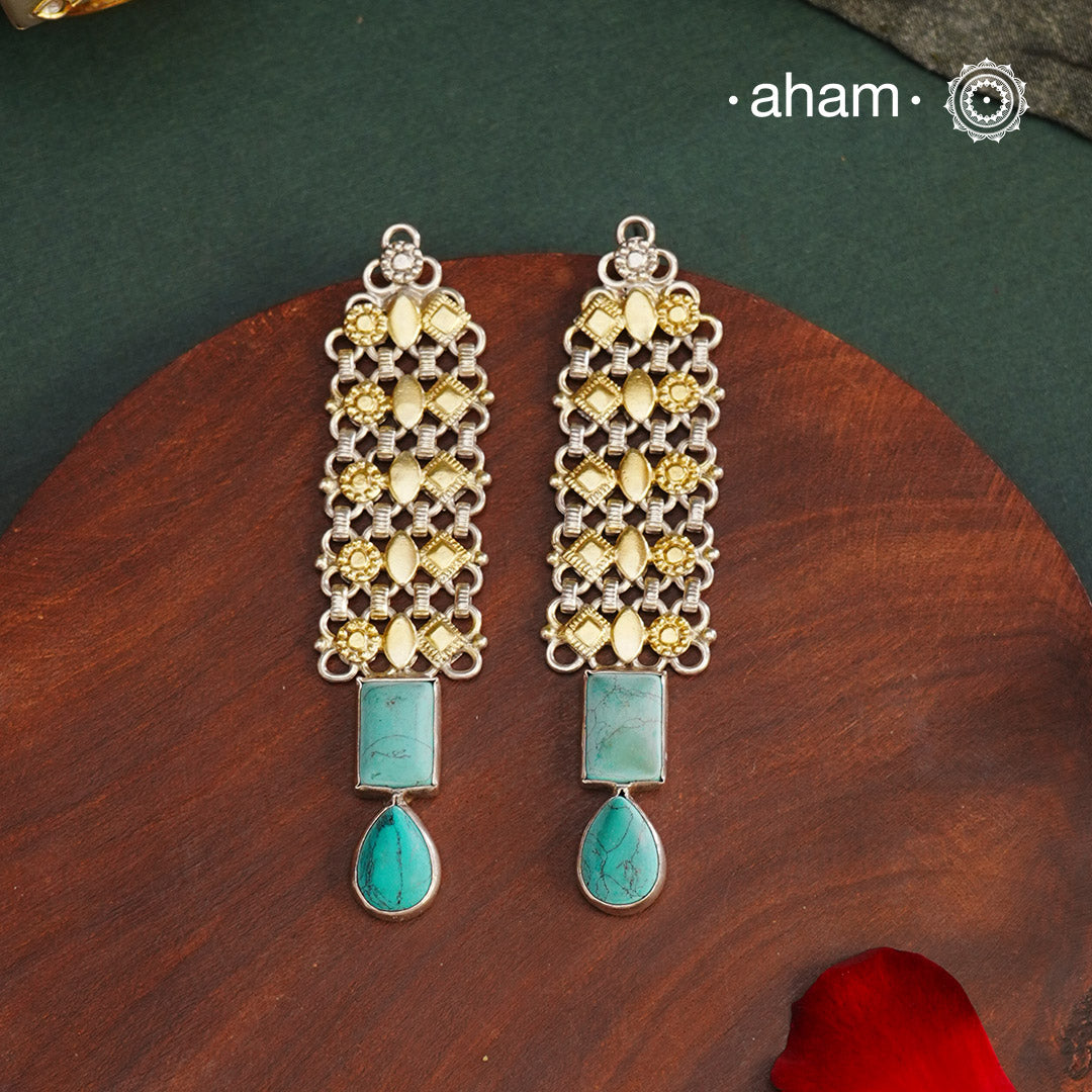 Noori two tone handcrafted in 92.5 sterling silver with gold highlights and turquoise drop. Style this up with your favourite ethnic or fusion outfits to complete the look.