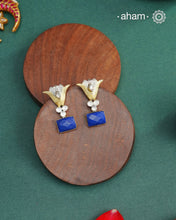 Noori two tone Earrings. The earrings are handcrafted in 92.5 sterling silver with gold highlights. Style this up with your favourite ethnic or fusion outfits to complete the look.
