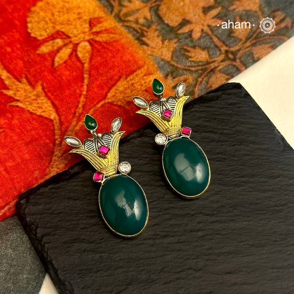 Noori two tone Earrings. The earrings are handcrafted in 92.5 sterling silver with gold highlights. Style this up with your favourite ethnic or fusion outfits to complete the look.