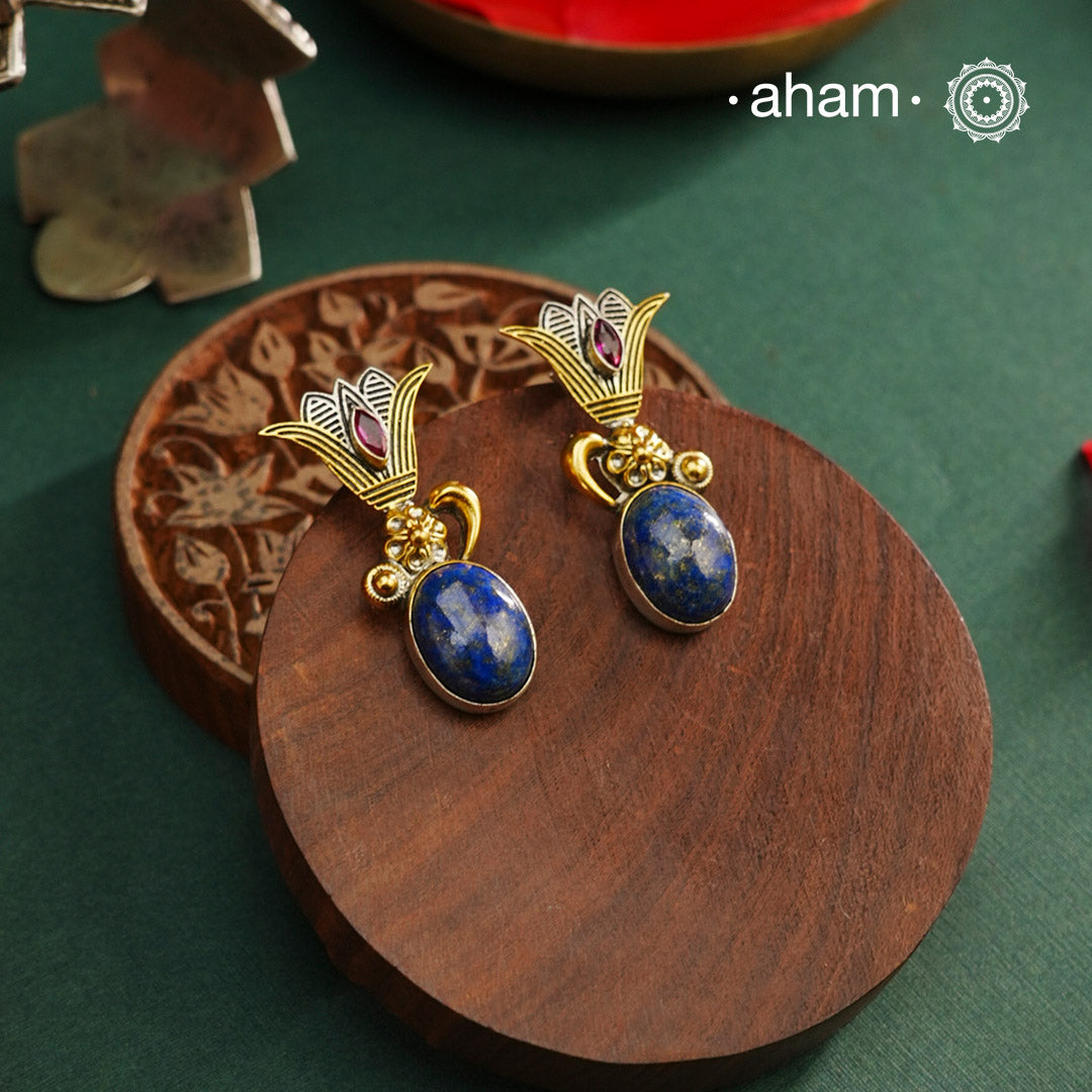 Noori two tone Earrings. The earrings are handcrafted in 92.5 sterling silver with gold highlights and lapiz stone. Style this up with your favourite ethnic or fusion outfits to complete the look.