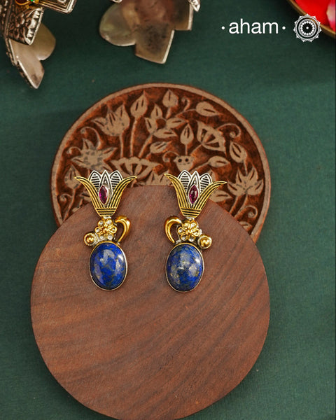 Noori two tone Earrings. The earrings are handcrafted in 92.5 sterling silver with gold highlights and lapiz stone. Style this up with your favourite ethnic or fusion outfits to complete the look.
