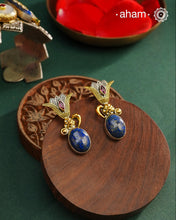 Noori two tone Earrings. The earrings are handcrafted in 92.5 sterling silver with gold highlights and lapiz stone. Style this up with your favourite ethnic or fusion outfits to complete the look.