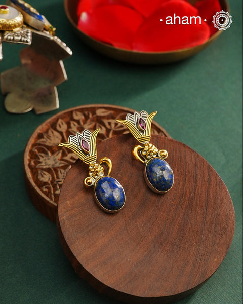 Noori two tone Earrings. The earrings are handcrafted in 92.5 sterling silver with gold highlights and lapiz stone. Style this up with your favourite ethnic or fusion outfits to complete the look.