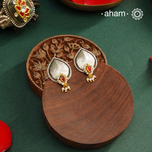 Noori two tone Earrings. The earrings are handcrafted in 92.5 sterling silver with gold highlights. Style this up with your favourite ethnic or fusion outfits to complete the look.