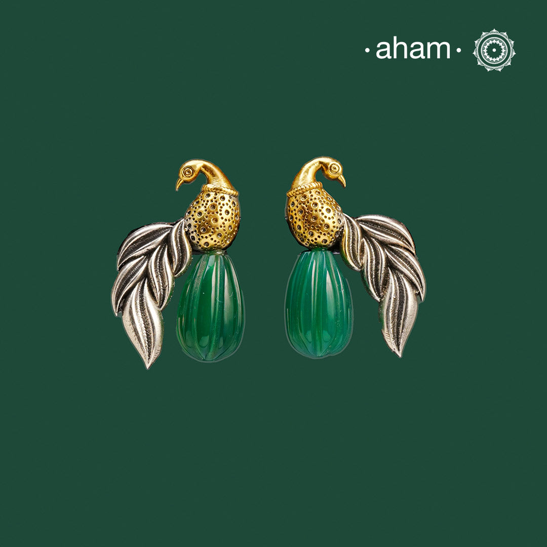 Noori two tone Earrings. The earrings are handcrafted in 92.5 sterling silver with gold highlights. Style this up with your favourite ethnic or fusion outfits to complete the look.