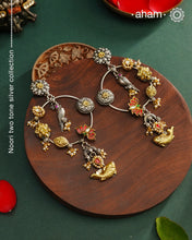 Noori two tone Earrings. The earrings are handcrafted in 92.5 sterling silver with gold kundan and pearl highlights. Style this up with your favourite ethnic or fusion outfits to complete the look.