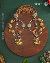 Noori two tone Earrings. The earrings are handcrafted in 92.5 sterling silver with gold kundan and pearl highlights. Style this up with your favourite ethnic or fusion outfits to complete the look.