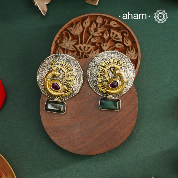 Noori two tone Earrings. The earrings are handcrafted in 92.5 sterling silver with gold highlights. Style this up with your favourite ethnic or fusion outfits to complete the look.