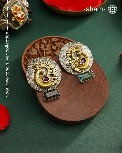 Noori two tone Earrings. The earrings are handcrafted in 92.5 sterling silver with gold highlights. Style this up with your favourite ethnic or fusion outfits to complete the look.
