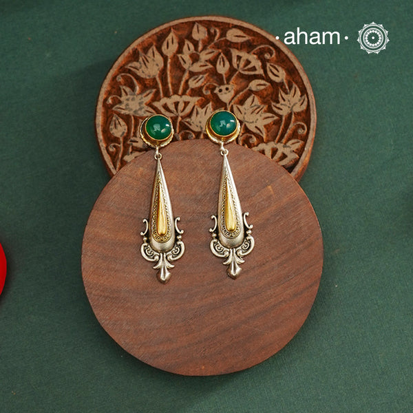 Noori two tone Earrings. The earrings are handcrafted in 92.5 sterling silver with gold highlights. Style this up with your favourite ethnic or fusion outfits to complete the look.