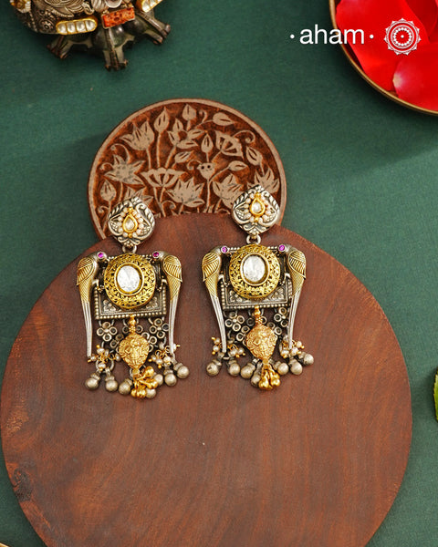 Noori dual tone parrot Earrings. The earrings are handcrafted in 92.5 sterling silver with kudan, pearl and  gold highlights. Style this up with your favourite ethnic or fusion outfits to complete the look.