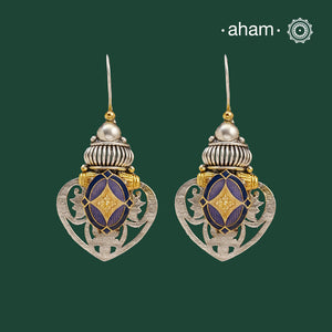 Noori two tone Earrings. The earrings are handcrafted in 92.5 sterling silver with gold tones and stunning enamel highlight in the center.Style this up with your favourite ethnic or fusion outfits to complete the look