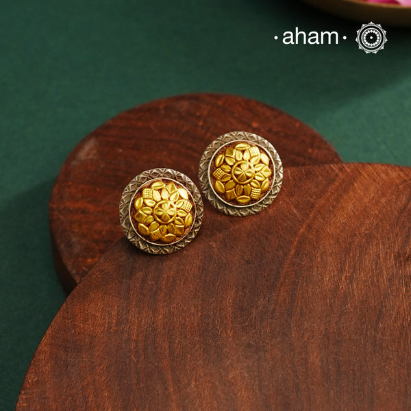 Enhance your style with the timeless elegance of the Dual Tone Silver Earrings. Handcrafted by skilled karigars in Barmer, Rajasthan, this earring features traditional Bandhel work, where a thin sheet of hand beaten 22 carat gold is fused with 92.5 silver and then set on 92.5 silver using a unique wax filling technique. A classic representation of Indian craftsmanship.