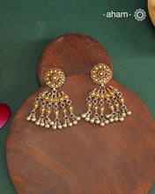 Enhance your style with the timeless elegance of the Dual Tone Silver Earrings. Handcrafted by skilled karigars in Barmer, Rajasthan, this earring features traditional Bandhel work, where a thin sheet of hand beaten 22 carat gold is fused with 92.5 silver and then set on 92.5 silver using a unique wax filling technique. A classic representation of Indian craftsmanship.
