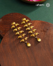 Enhance your style with the timeless elegance of the Dual Tone Silver Earrings. Handcrafted by skilled karigars in Barmer, Rajasthan, this earring features traditional Bandhel work, where a thin sheet of hand beaten 22 carat gold is fused with 92.5 silver and then set on 92.5 silver using a unique wax filling technique. A classic representation of Indian craftsmanship.