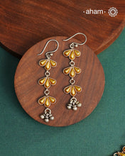 Enhance your style with the timeless elegance of the Dual Tone Silver Earrings. Handcrafted by skilled karigars in Barmer, Rajasthan, this earring features traditional Bandhel work, where a thin sheet of hand beaten 22 carat gold is fused with 92.5 silver and then set on 92.5 silver using a unique wax filling technique. A classic representation of Indian craftsmanship.