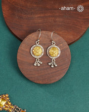 Enhance your style with the timeless elegance of the Dual Tone Silver Earrings. Handcrafted by skilled karigars in Barmer, Rajasthan, this earring features traditional Bandhel work, where a thin sheet of hand beaten 22 carat gold is fused with 92.5 silver and then set on 92.5 silver using a unique wax filling technique. A classic representation of Indian craftsmanship.