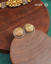 Enhance your style with the timeless elegance of the Dual Tone Silver Earrings. Handcrafted by skilled karigars in Barmer, Rajasthan, this earring features traditional Bandhel work, where a thin sheet of hand beaten 22 carat gold is fused with 92.5 silver and then set on 92.5 silver using a unique wax filling technique. A classic representation of Indian craftsmanship.&nbsp;