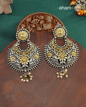 Noori two tone Chandbali earrings handcrafted in 92.5 sterling silver with gold highlights.Style this up with your favourite ethnic or fusion outfits to complete the look.