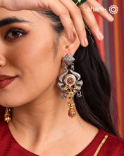 Noori two tone earrings handcrafted in 92.5 sterling silver with kundan and gold highlights.Style this up with your favourite ethnic or fusion outfits to complete the look.