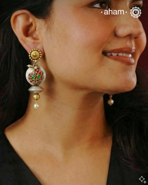 Noori two tone Earrings. The earrings are handcrafted in 92.5 sterling silver with kundan and gold highlights.&nbsp;Style this up with your favourite ethnic or fusion outfits to complete the look.