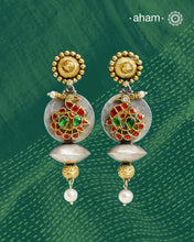 Noori two tone Earrings. The earrings are handcrafted in 92.5 sterling silver with kundan and gold highlights. Style this up with your favourite ethnic or fusion outfits to complete the look.