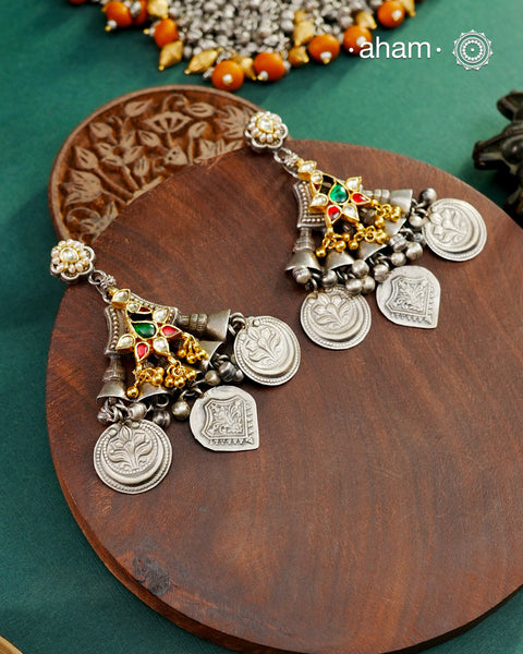 Noori two tone Earrings handcrafted in 92.5 sterling silver with kundan and gold highlights.Style this up with your favourite ethnic or fusion outfits to complete the look.