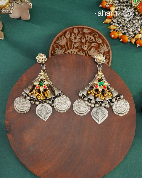 Noori two tone Earrings handcrafted in 92.5 sterling silver with kundan and gold highlights.Style this up with your favourite ethnic or fusion outfits to complete the look.