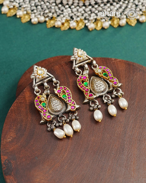 Noori two tone Earrings. The earrings are handcrafted in 92.5 sterling silver with kundan and gold highlights.&nbsp;Style this up with your favourite ethnic or fusion outfits to complete the look.