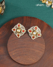 Noori two tone Peacock Earrings handcrafted in 92.5 sterling silver with kundan and gold highlights.tyle this up with your favourite ethnic or fusion outfits to complete the look.