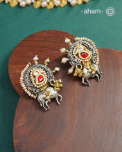 Noori two tone earrings handcrafted in 92.5 sterling silver with kundan and gold highlights. Style this up with your favourite ethnic or fusion outfits to complete the look.