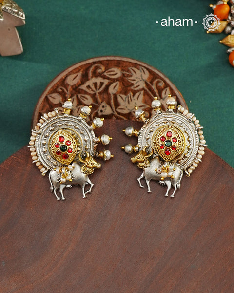 Noori two tone Earrings handcrafted in 92.5 sterling silver with kundan and gold highlights.Style this up with your favourite ethnic or fusion outfits to complete the look.